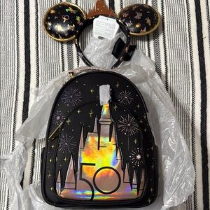 Loungefly Black and Gold Backpack with Holographic Design